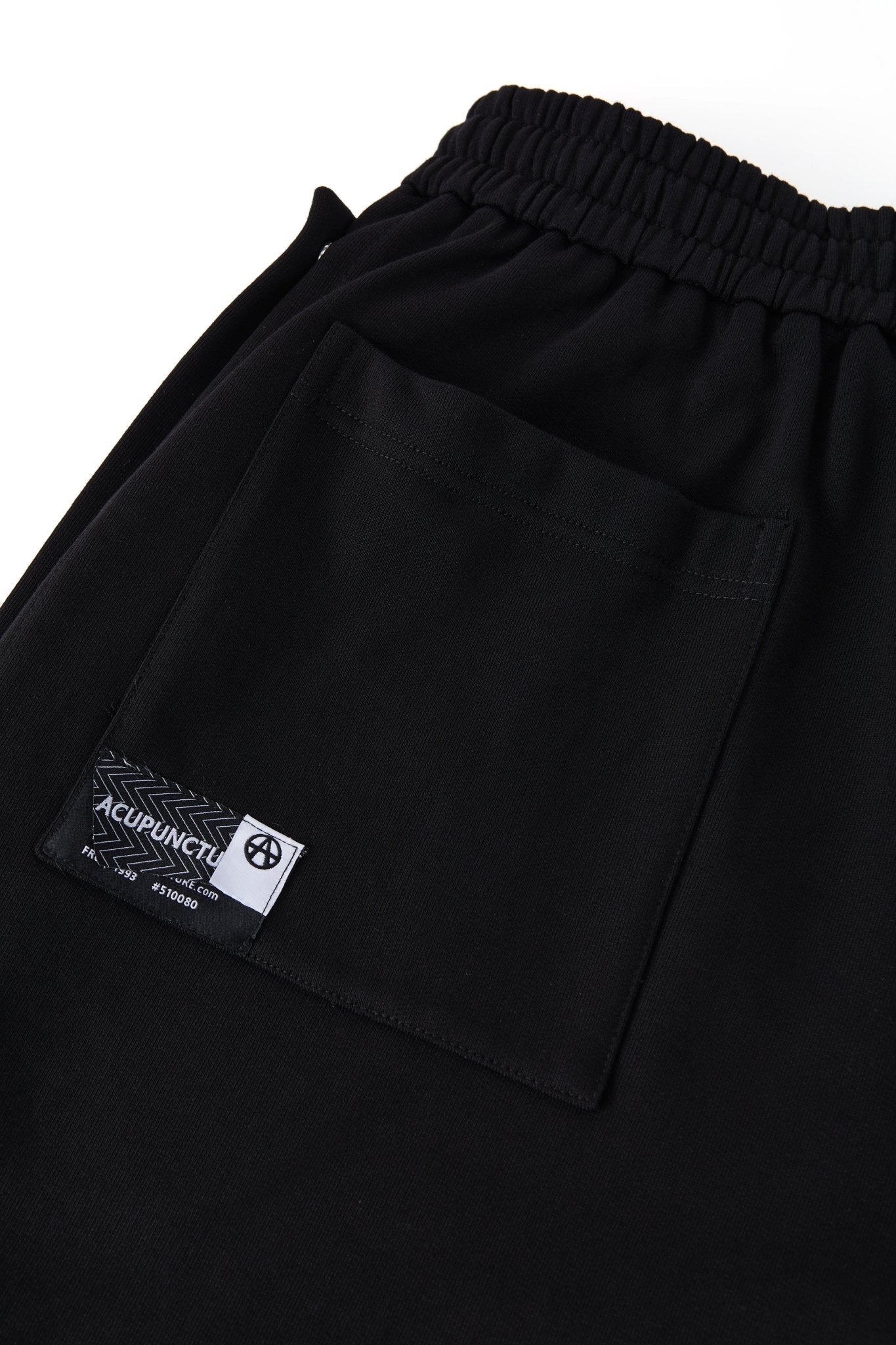 BUTTON SHORTS BLACK Acupuncture